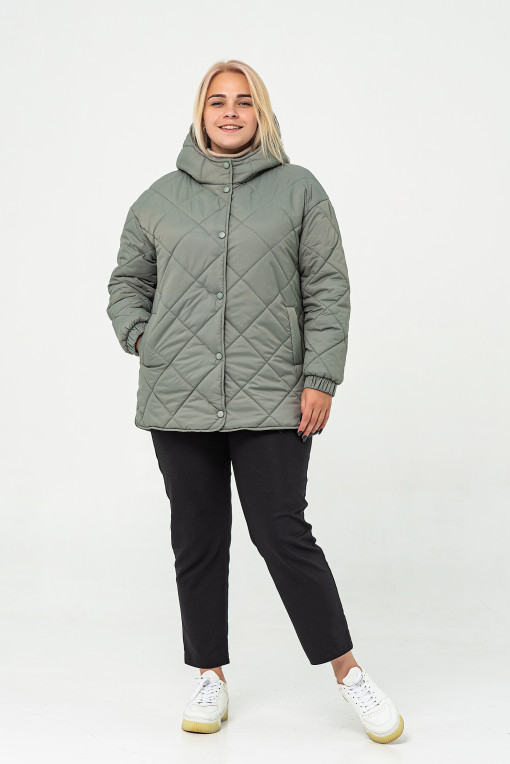 Осіння жіноча стьобана куртка фісташкового кольору